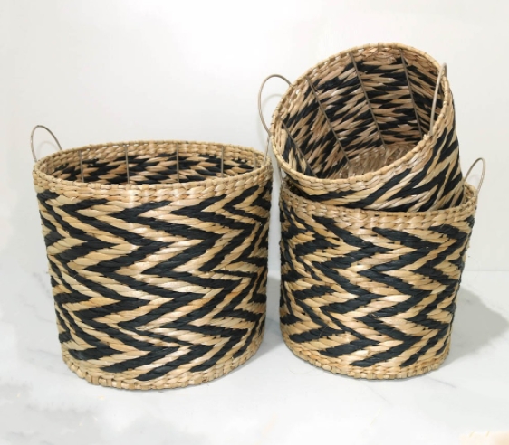 hand woven natural and black rush and paper storage basket with metal frame