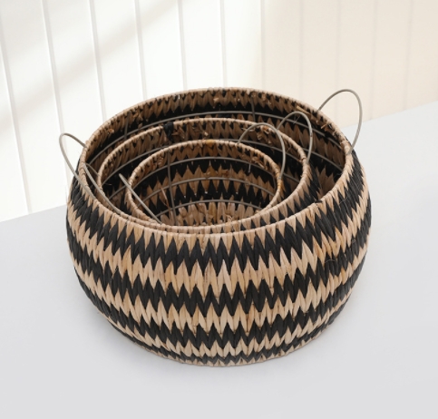 hand woven natural and black rush and paper storage basket with metal frame